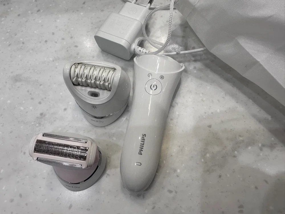 Эпилятор Philips BRE710 аккумулятор до 40 мин, 2 скорости, 32 пинцета
