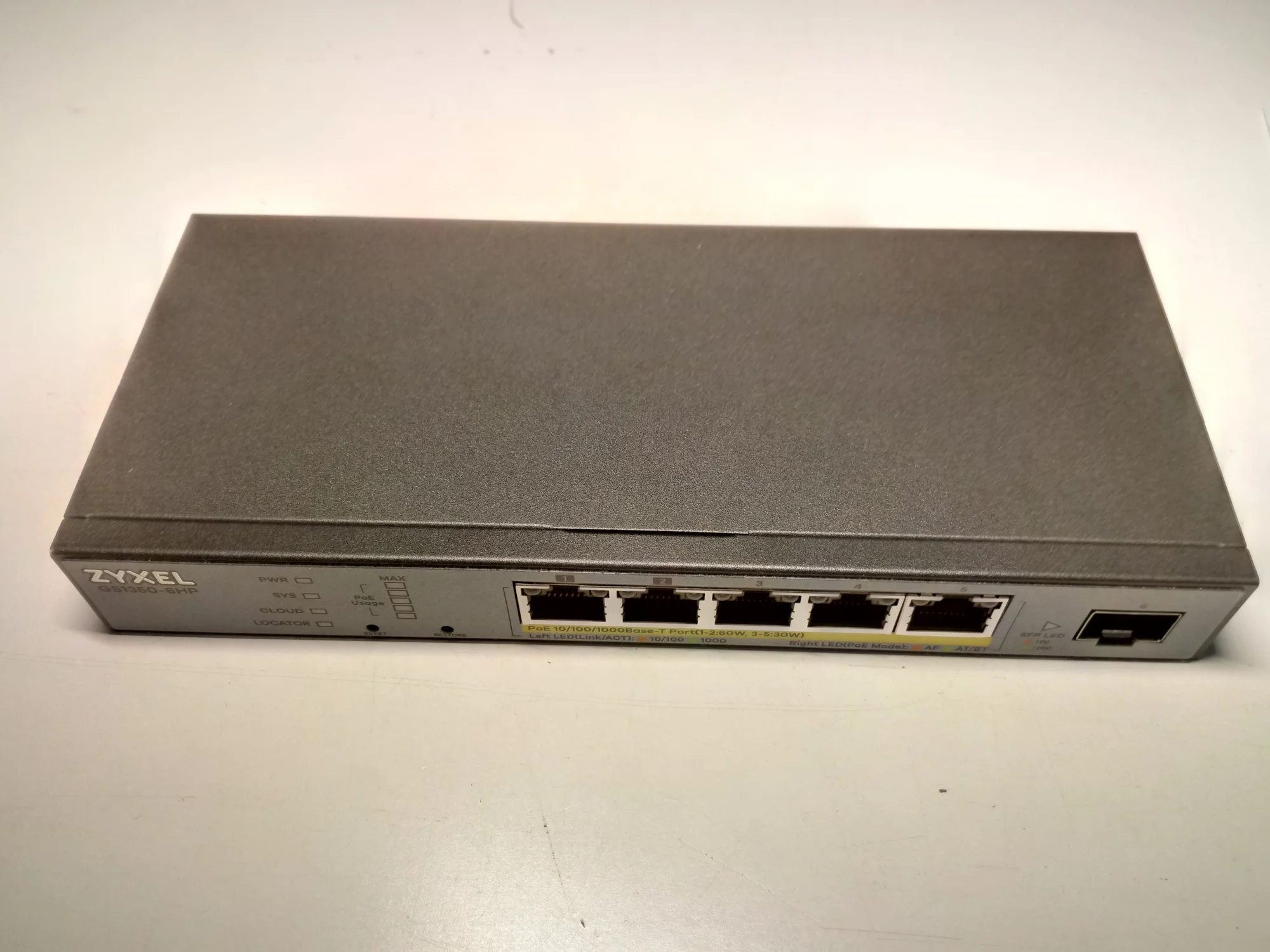 Коммутатор Zyxel GS1350-6HP, 4xGE PoE+, 1xGE PoE++ (802.3bt), 1xSFP, бюджет PoE 60 Вт, дальность передачи питания до 250 м, автоперезагрузка PoE-порто