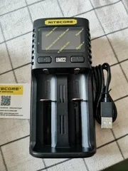 Батарейка, аккумулятор и зарядное устройство для него Nitecore UMS2 18650/21700 на 2*АКБ Intellicharge V2, совместимо с Li-ion/IMR и Ni-MH/Ni-Cd аккум