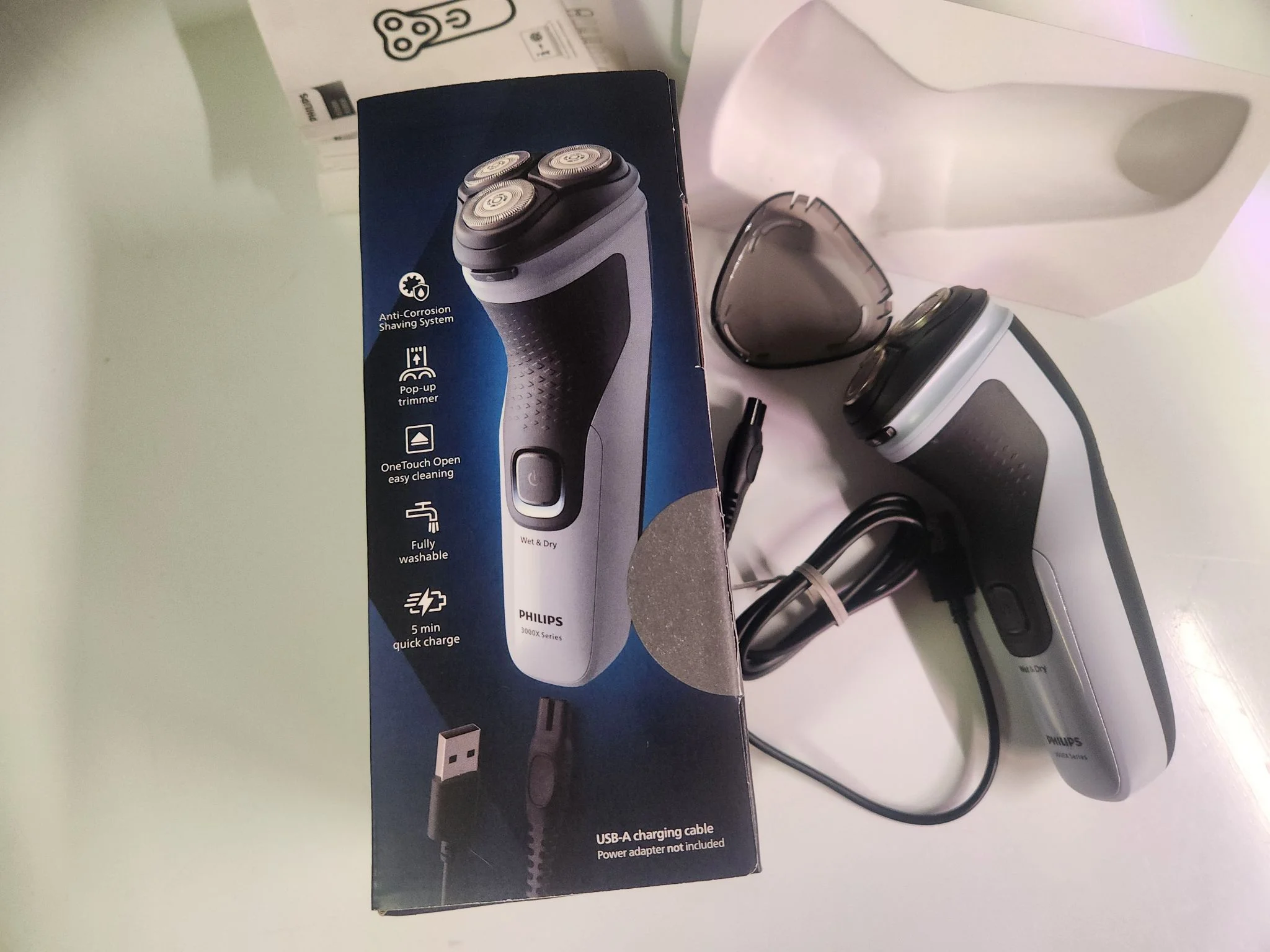 Электробритва роторная Philips X3003/00 реж.эл.:3 питан.:аккум. голубой/черный