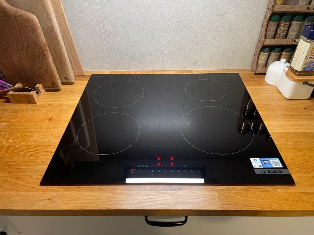 Индукционная варочная панель Bosch PIF631HB1E, 60 см, индукция, скошенные края, сенсорное управление, черный