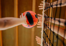 Волейболисты московского «Динамо» триумфально выиграли Кубок России в матче с «Зенитом» LowAngleViewOfAVolleyballPlayersHandsBlockingA