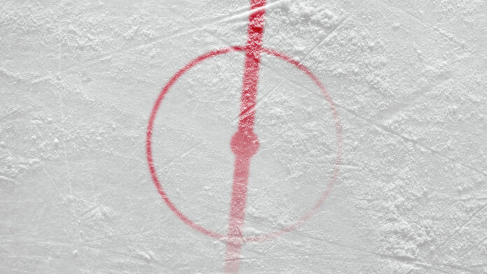 FragmentOfIceHockeyRinkWithACentralCircleConcept