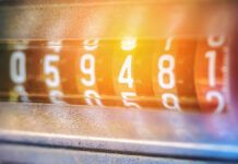 Close-upElectricMeterFiguresControlOfPowerConsumptionTopicOf