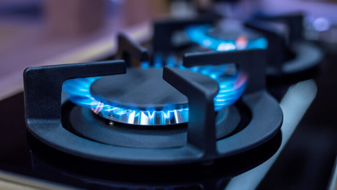 ModernKitchenStoveCookWithBlueFlamesBurning