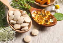 Три ключевых витамина для восстановления организма весной DifferentPillsHerbsAndFlowersOnWoodenTableCloseupDietary