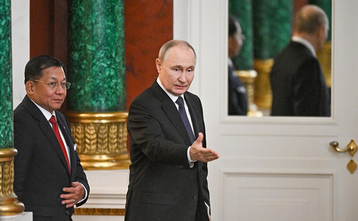 Мин Аунг Хлайн и Владимир Путин (Сергей Бобылев / ТАСС)