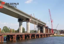 Владимир Путин и Руслан Кухарук торжественно открыли мост Звезда Оби в Сургуте vladimir putin i ruslan kuharuk torzhestvenno otkryli most zvezda obi v surgute-todey-ru-0