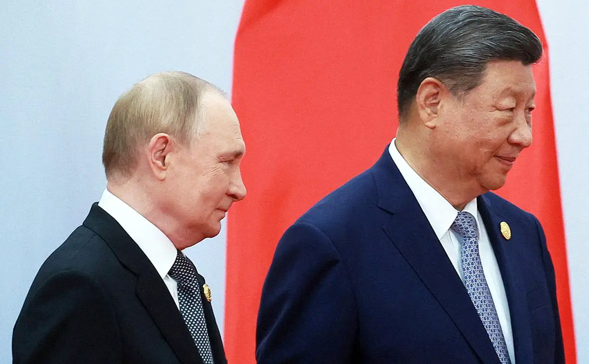 Владимир Путин и Си Цзиньпин (Владимир Смирнов / Sputnik / Reuters)