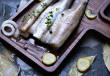 TraditionalDutchFoodHerringWithPickledCornichonsAndOnionOn