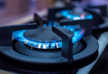 ModernKitchenStoveCookWithBlueFlamesBurning