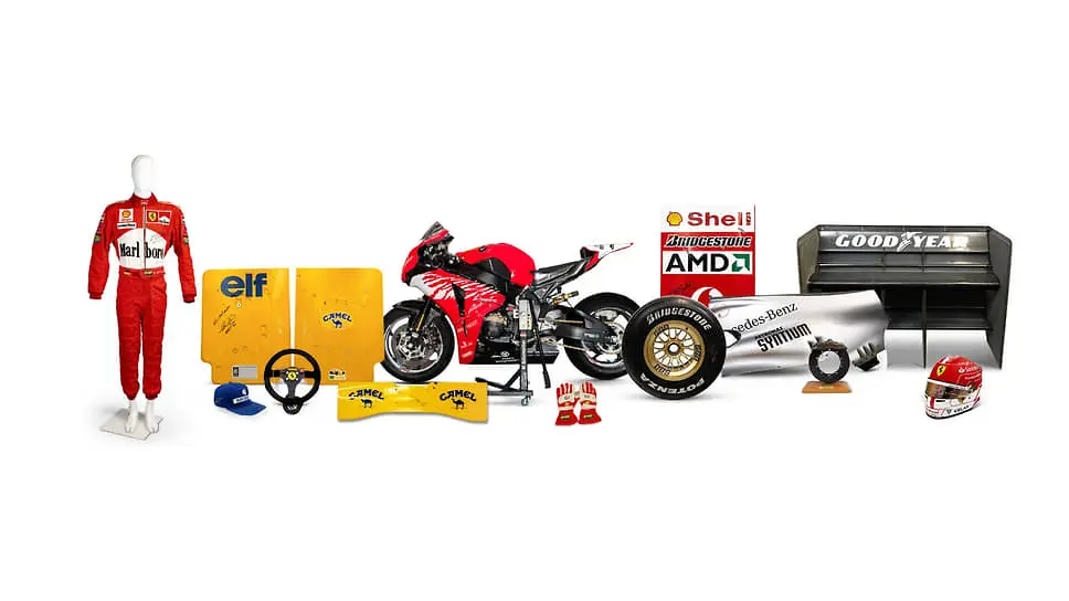 На аукционе звезды Formula-1 приобрели костюм Шумахера и часы Cartier-0