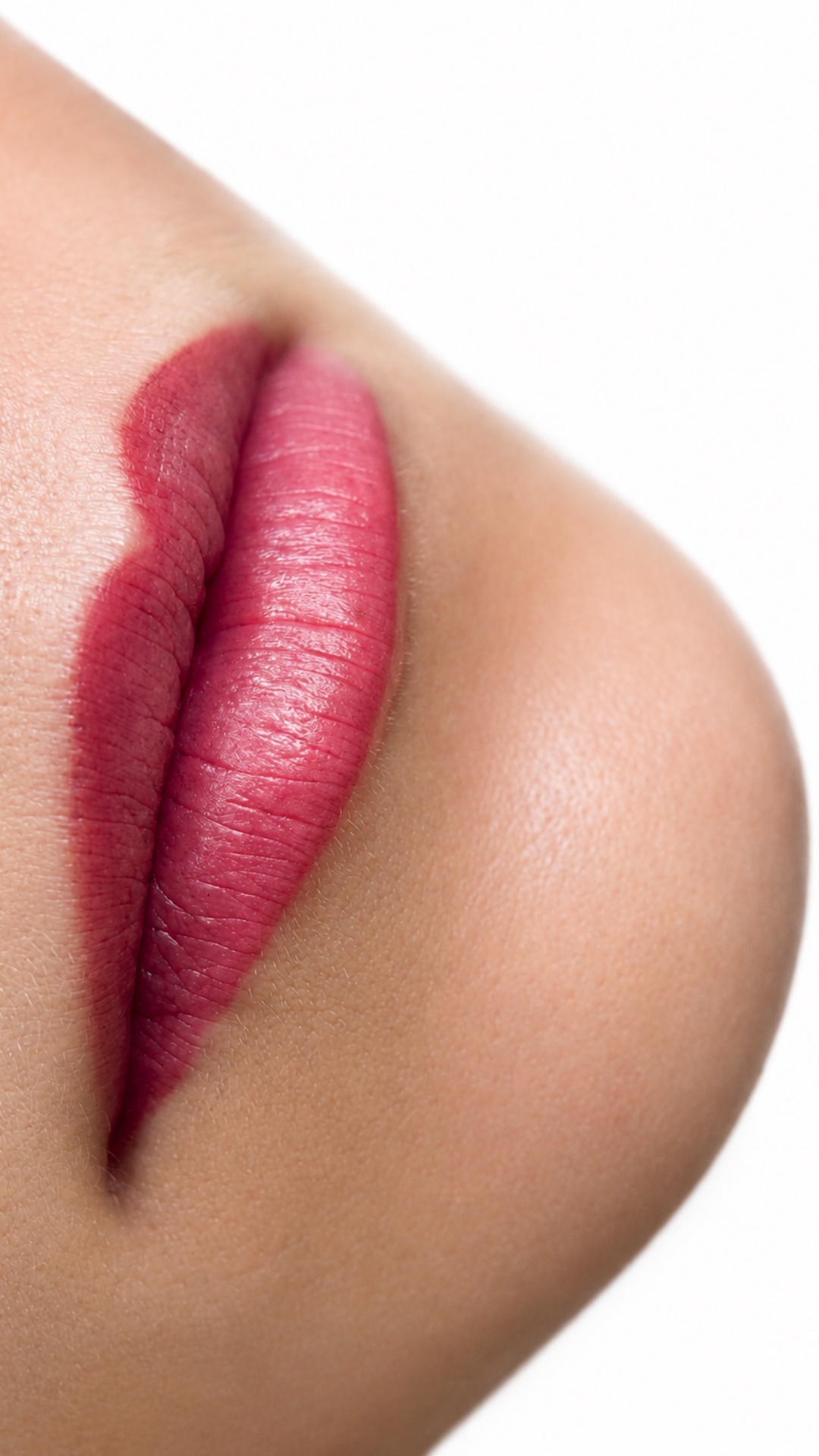 This task is skin-only retouching.

The image must be set on a clean, seamless pure white backgro...