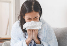 SickDayAtHomeAsianWomanHasRunnyAndCommon