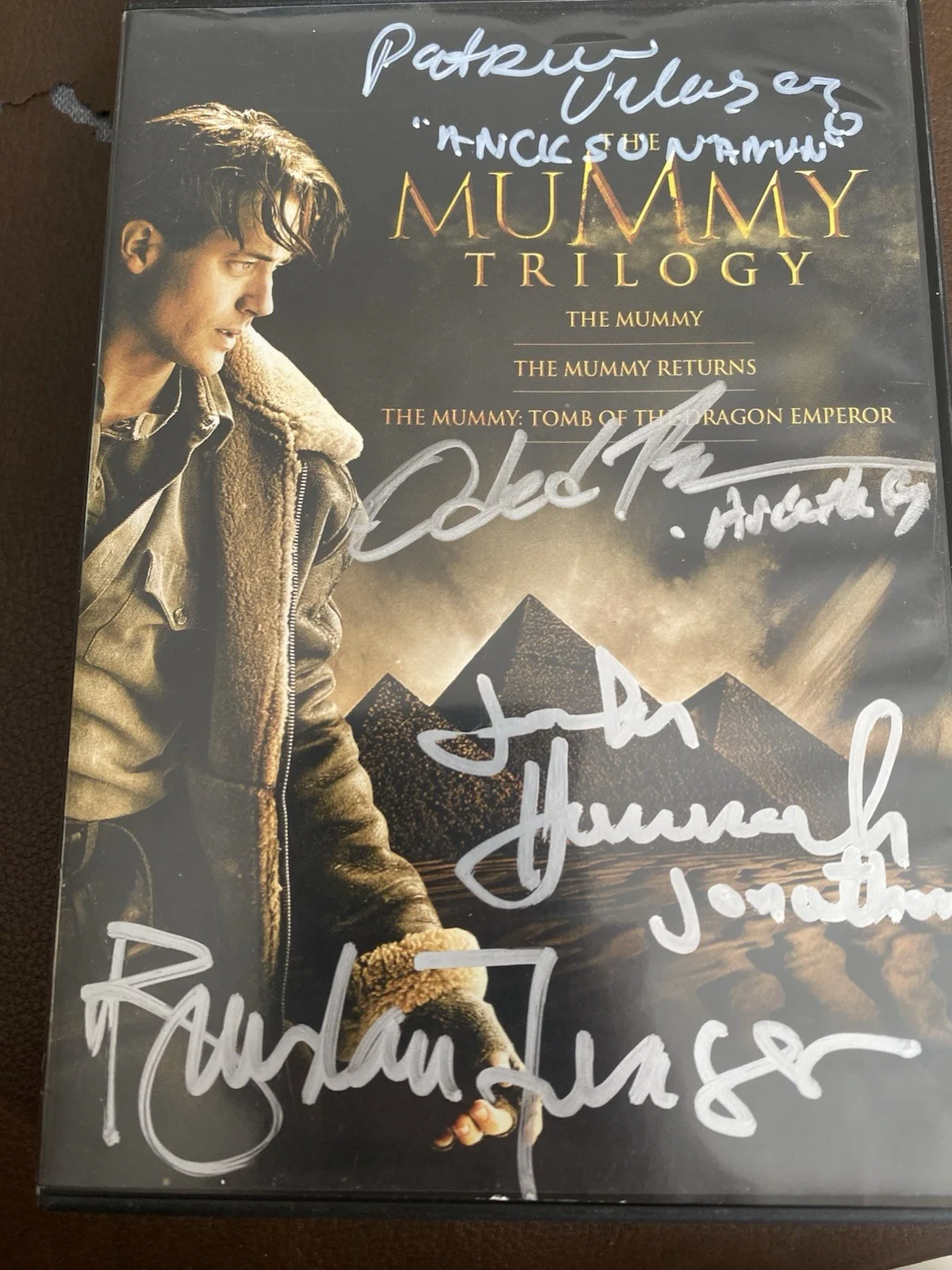 Brendan Fraser, John Hannah, Oded Fehr, Patricia Velasquez — The Mummy TRILOGY DVD Movie Signed by Fraser, Hannah, Fehr, and Velasquez