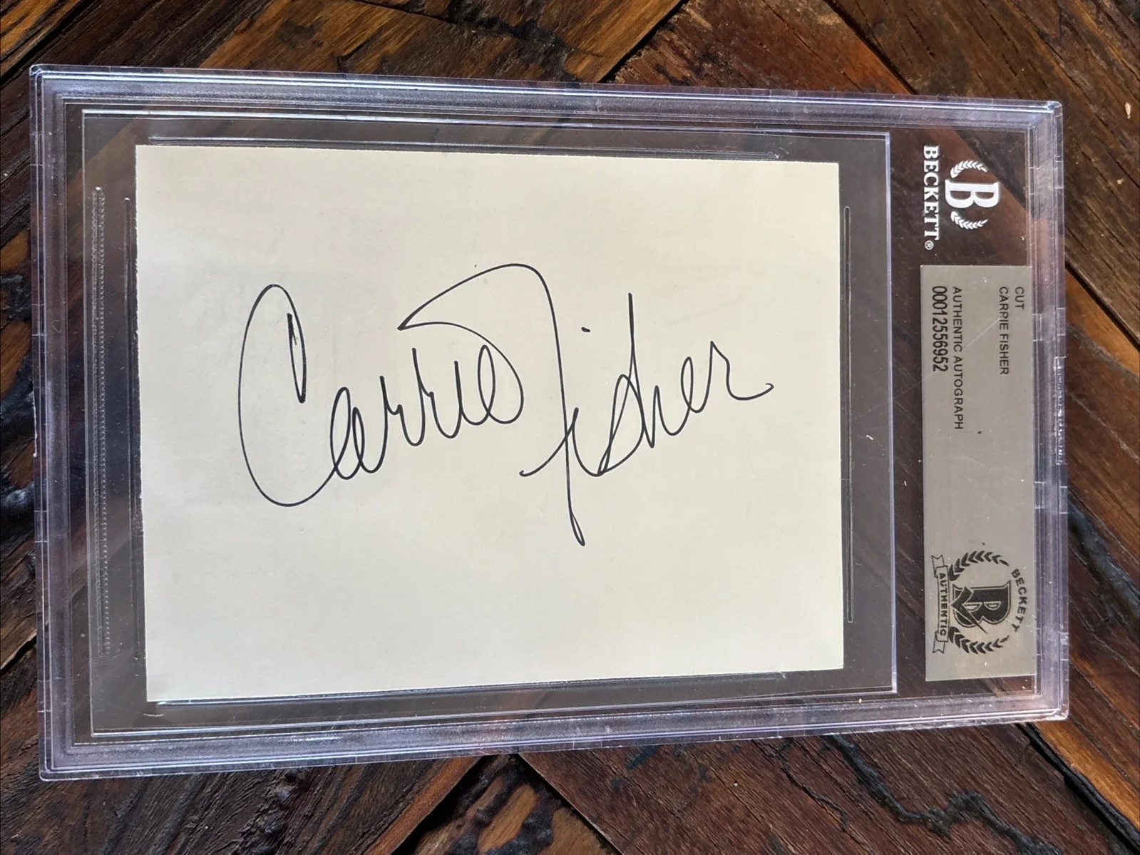 Carrie Fisher — CARRIE FISHER Cut Autograph Beckett Encased BAS Authentic Auto Star Wars Actress