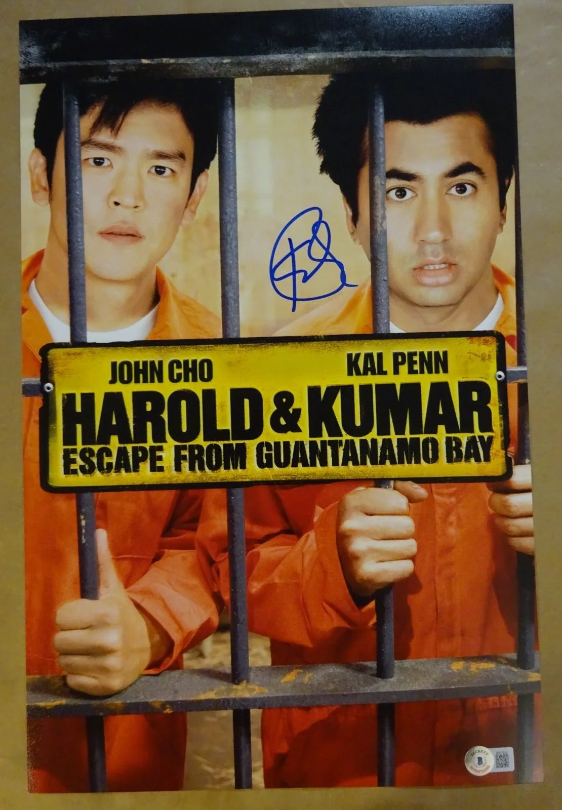 Kal Penn — Signed Kal Penn Autographed 11"x17" Harold & Kumar Guantanamo Bay Photo BAS COA