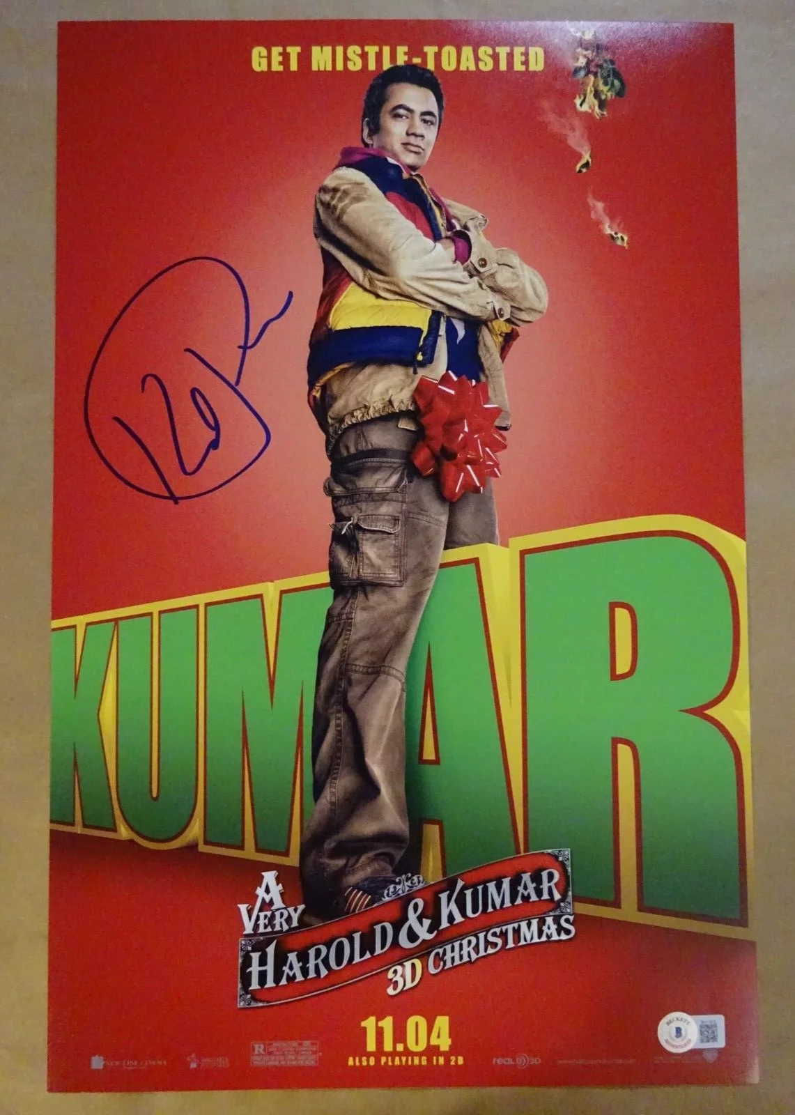 Kal Penn — Signed Kal Penn Autographed 11x17 Very Harold & Kumar 3D Christmas Photo BAS COA