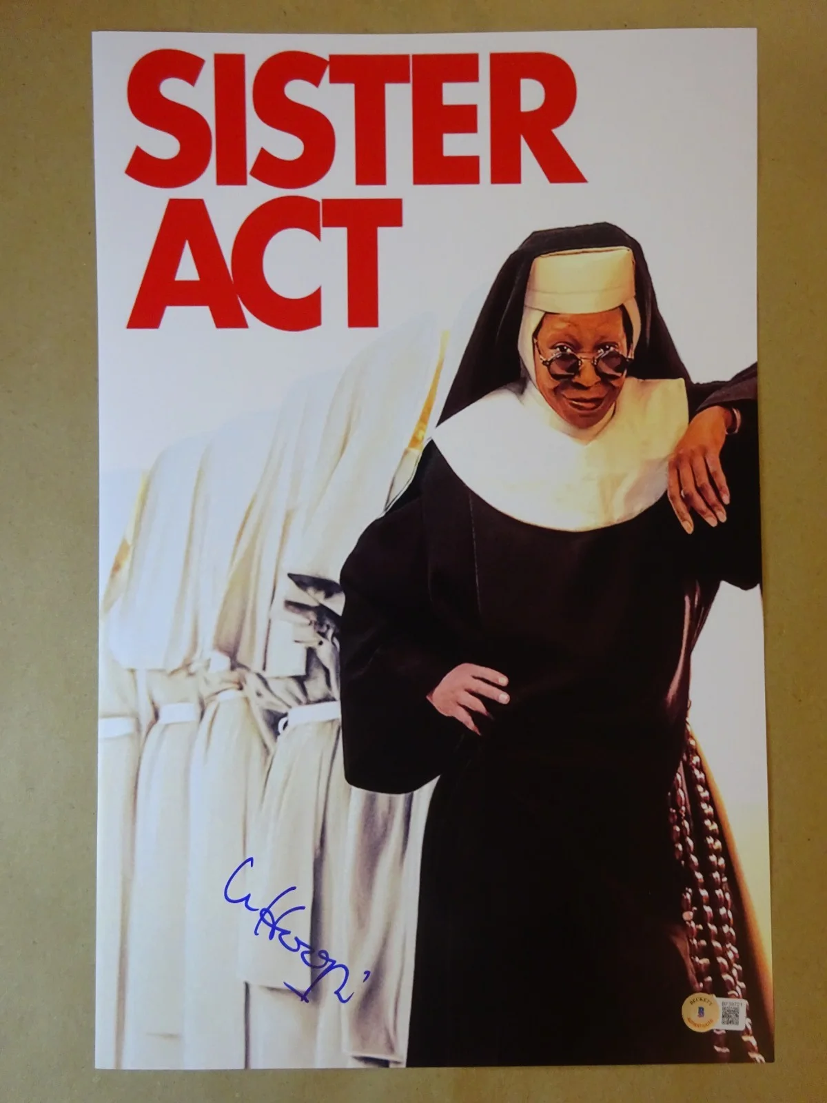 Whoopi Goldberg — Signed Whoopi Goldberg Autographed 11"x17" Sister Act Photo Beckett BAS COA