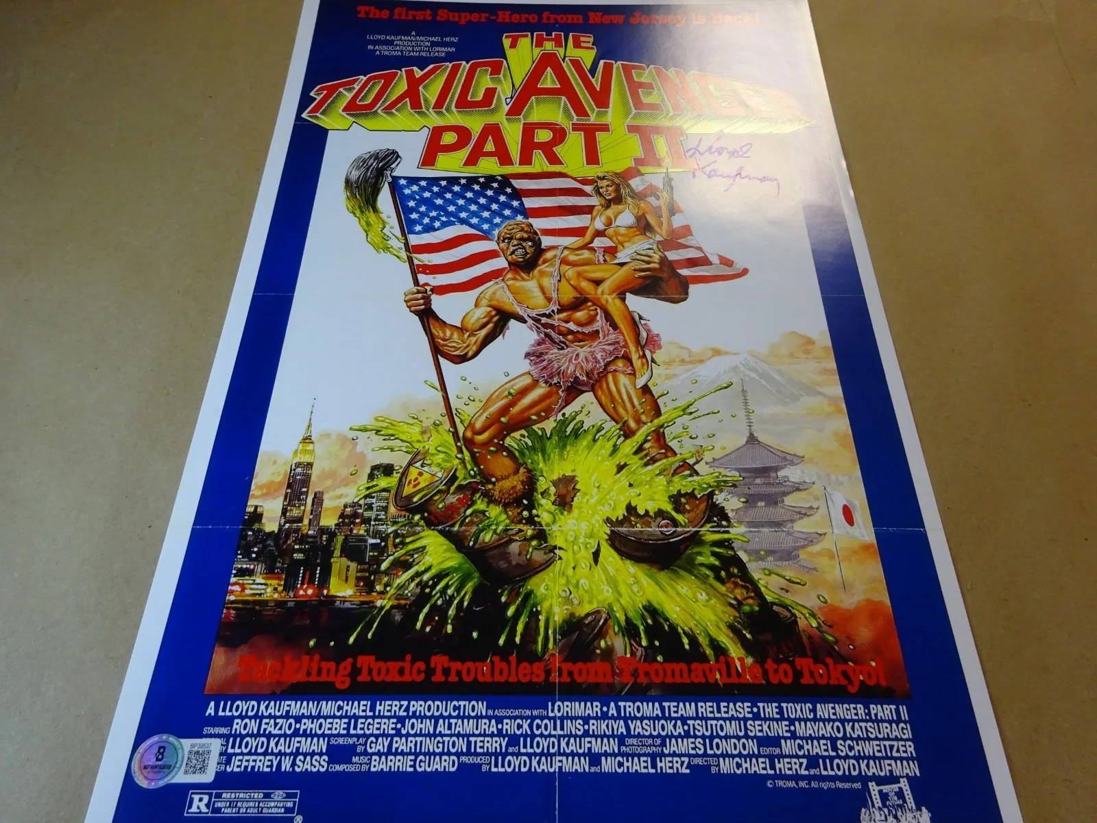 Lloyd Kaufman — Signed Lloyd Kaufman Autographed The Toxic Avenger Part II 11"x17" Photo BAS COA, image 2