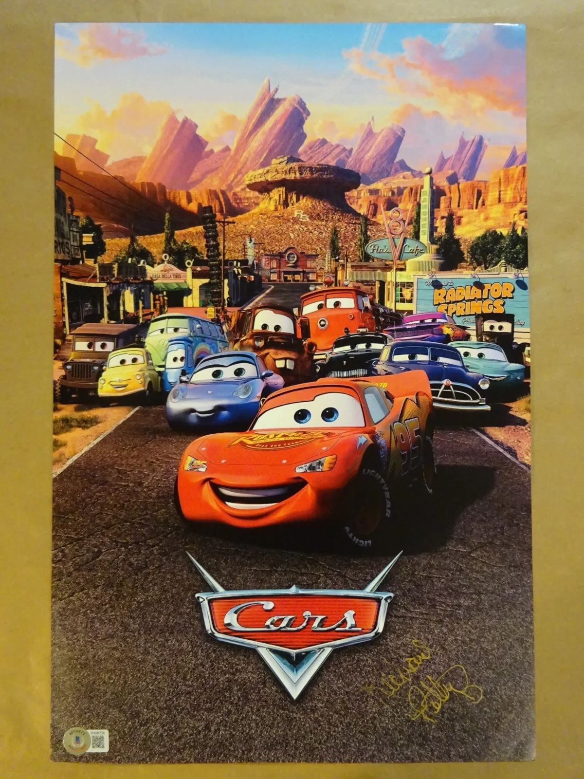 Richard Petty — Autographed Richard Petty Signed Disney Cars It 11"x17" Photo Beckett BAS COA
