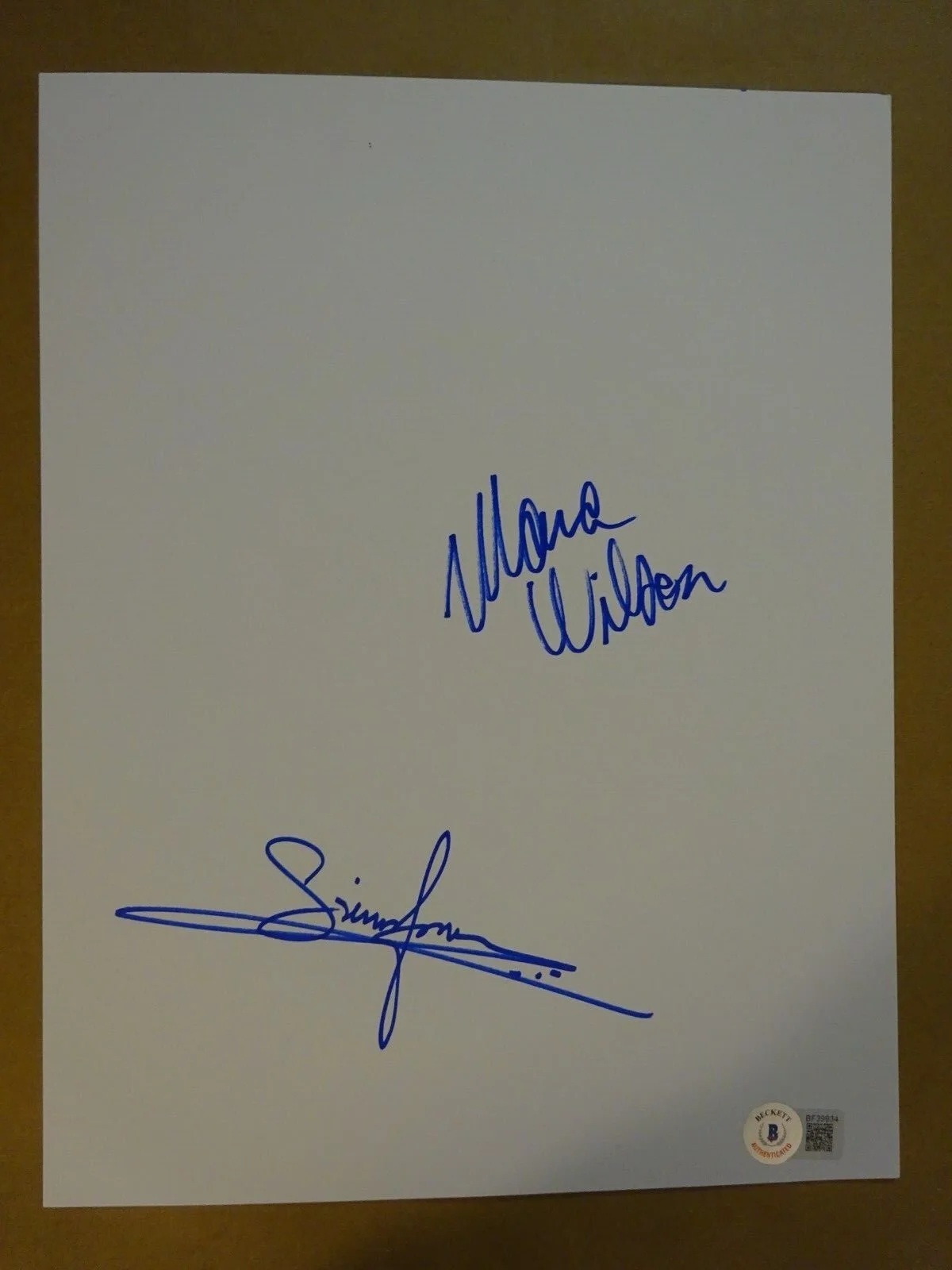 Mara Wilson and Simon Jones — Autographed SIMON JONES & MARA WILSON Signed White Sheet Paper BECKETT BAS COA