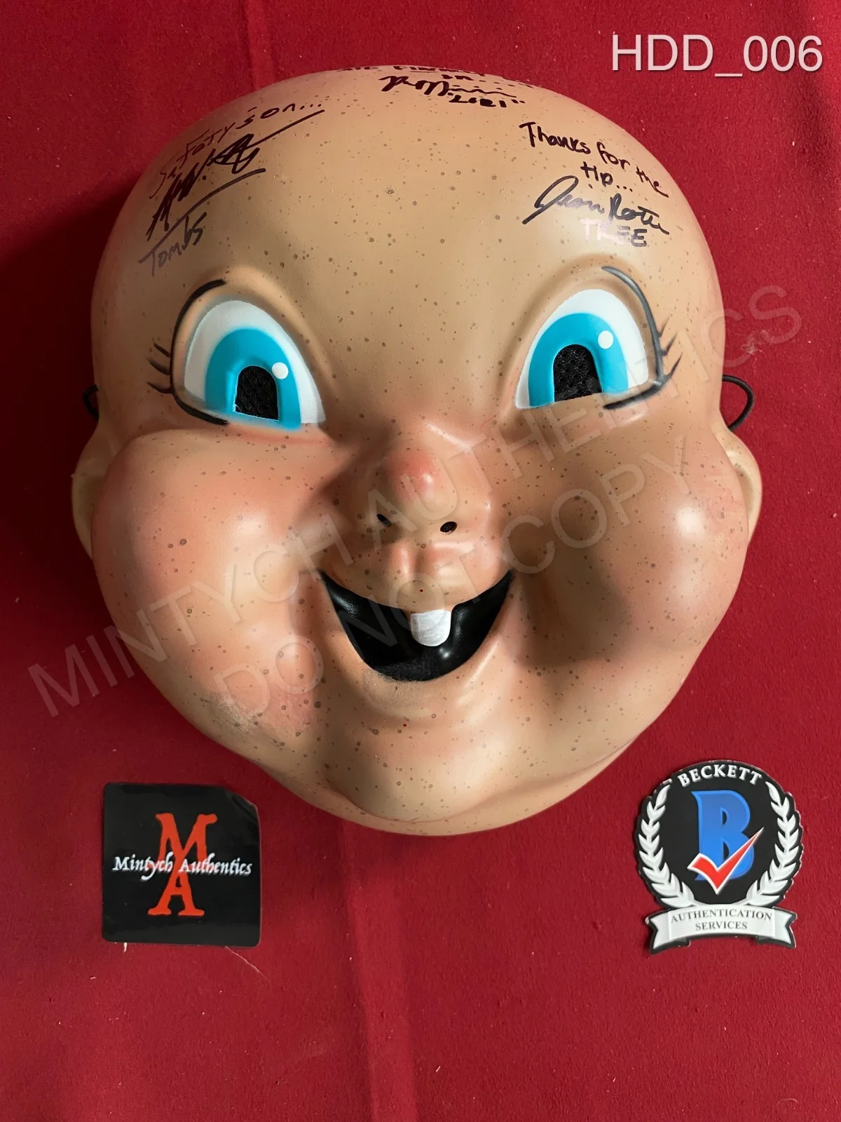Jessica Rothe & Rob Mello, Ruby Modine — Happy Death Day cast signed baby mask Jessica Rothe Ruby Modine Rob Mello