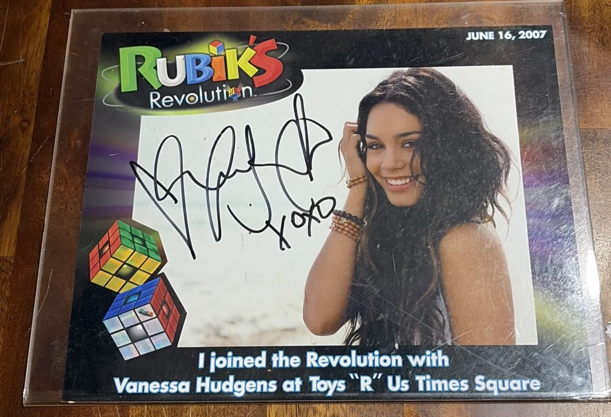 Vanessa Hudgens — Vanessa Hudgens Signed Rubik’s Revolution Promo Photo 2007 ToysRus Times Square