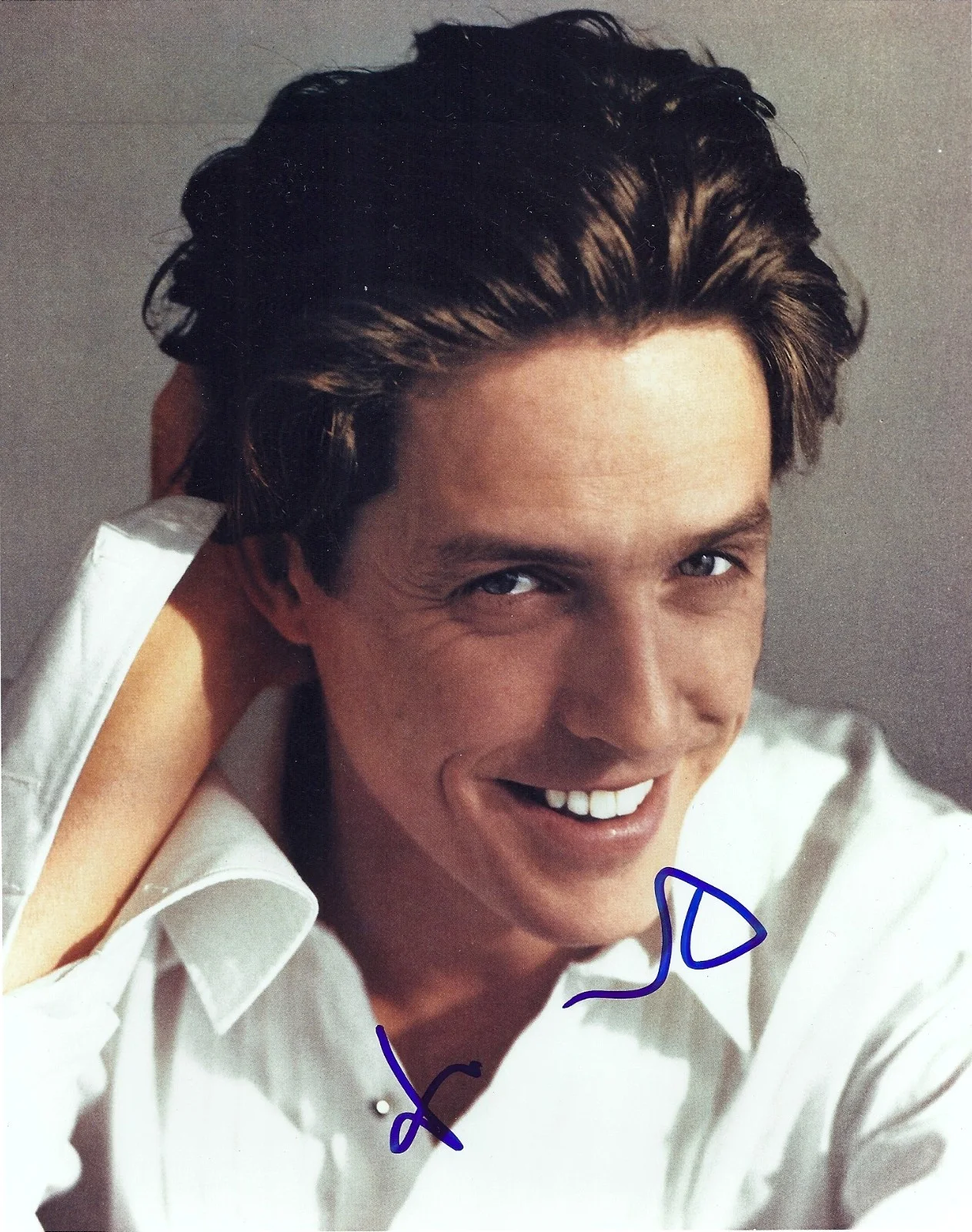 Hugh Grant — Hugh Grant Autographed 8":X 10" Color Photo