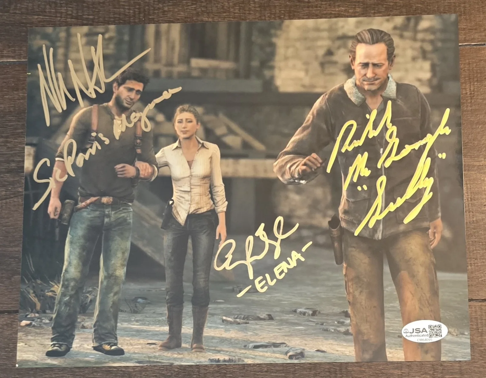 Nolan North, Emily Rose, Richard McGonagle — Uncharted 8x10 signed by Nolan North with Sic Parvis Magna Inscription, Emily...