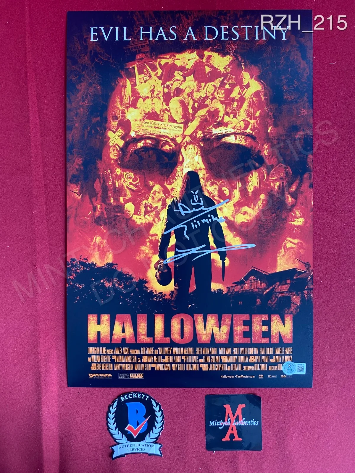 Daeg Faerch, Tyler Mane — Daeg Faerch Tyler Mane dual signed 11x17 photo Rob Zombie Halloween Beckett