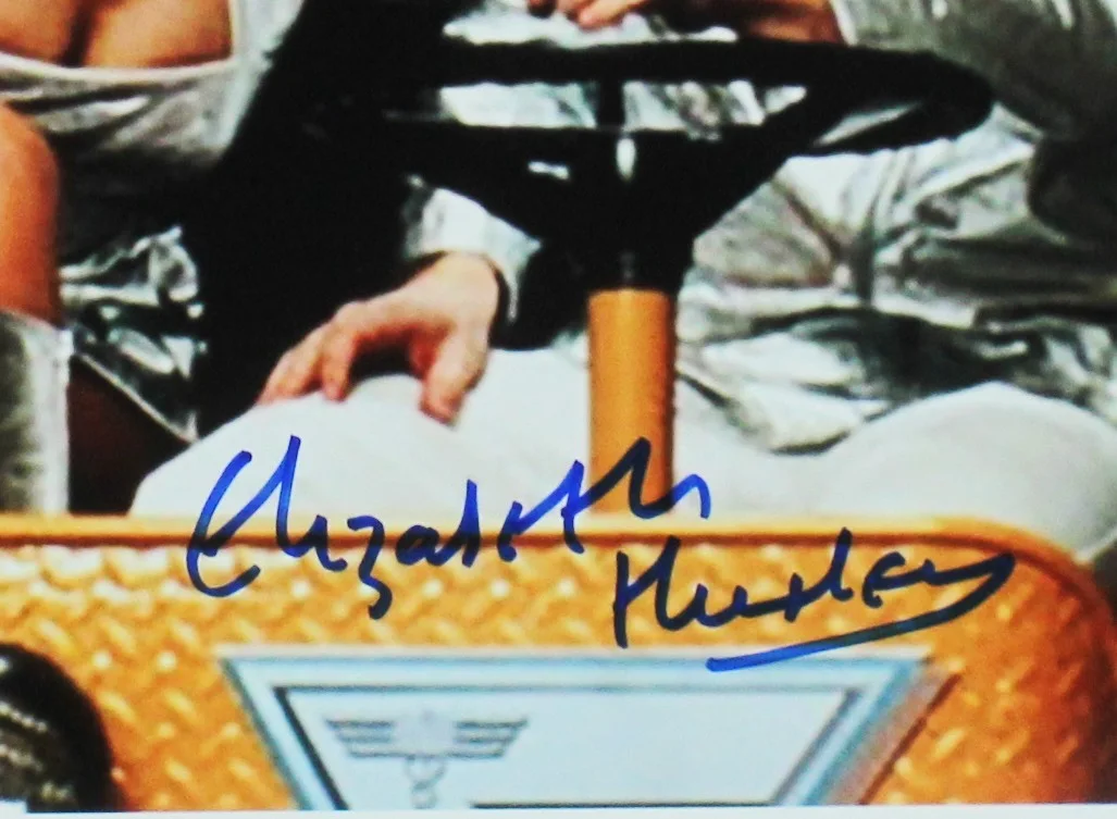 Elizabeth Hurley — Elizabeth Hurley Signed Austin Powers Unframed 11x14 On Cart with Powers Photo, image 2