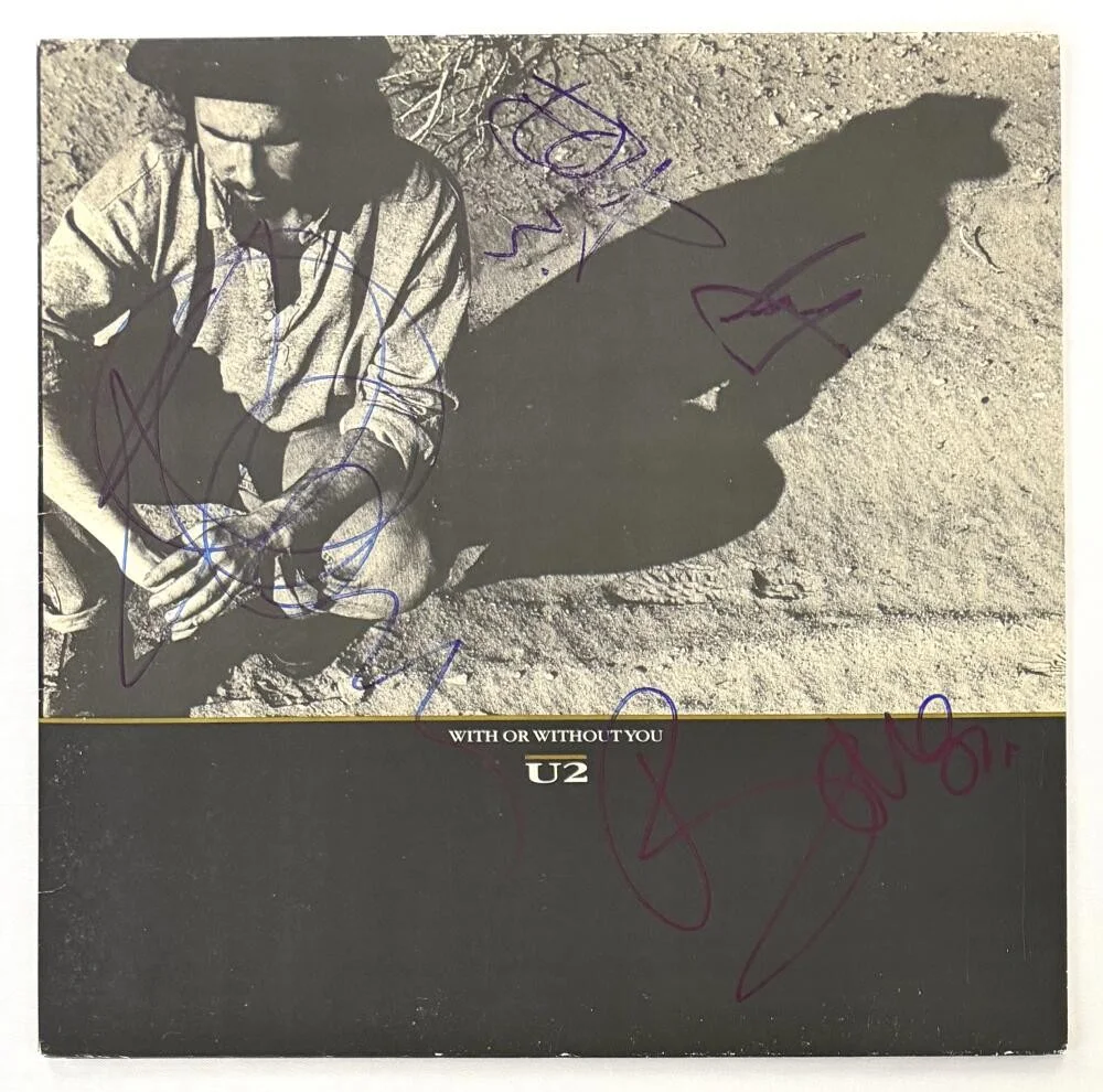 Bono, Adam Clayton, The Edge, Larry Mullen Jr — U2 Full Band Signed Autograph Album Record Larry Mullen Jr Bono Edge Adam w/ JSA