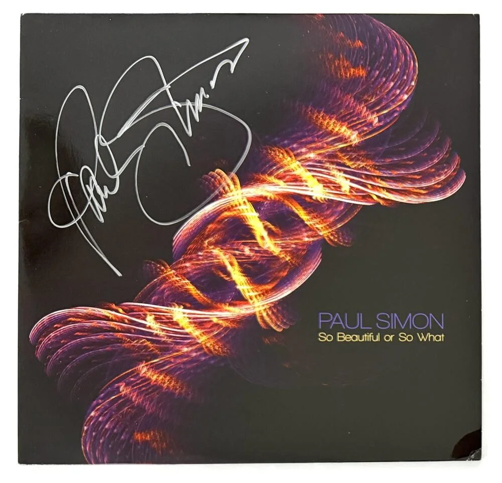 Paul Simon — Paul Simon Signed Autograph Album Record - So Beautiful or So What Beckett COA