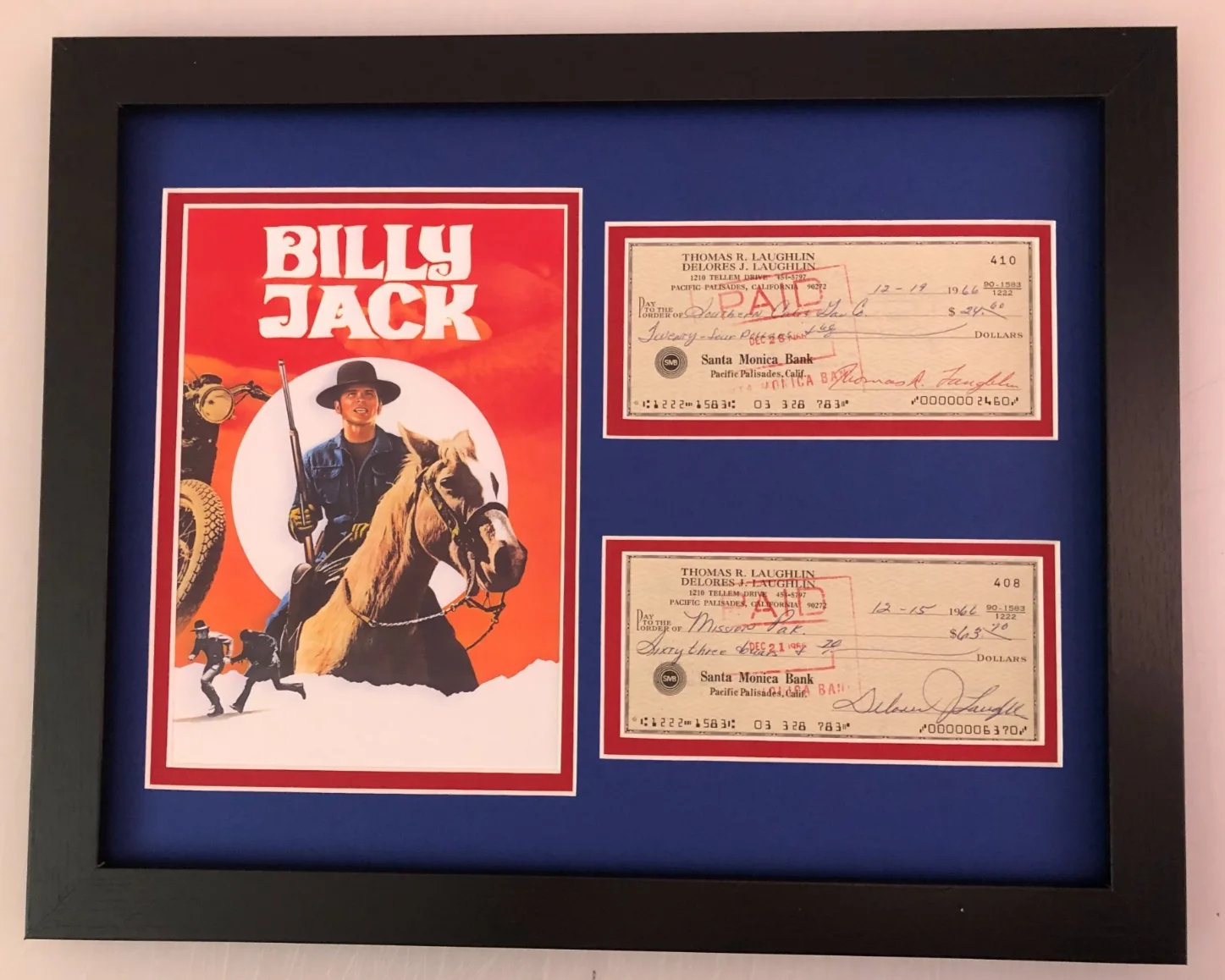 TOM LAUGHLIN & DELORES TAYLOR — TOM LAUGHLIN & DELORES TAYLOR SIGNED PHOTO DISPLAY "BILLY JACK" JSA LOA COA