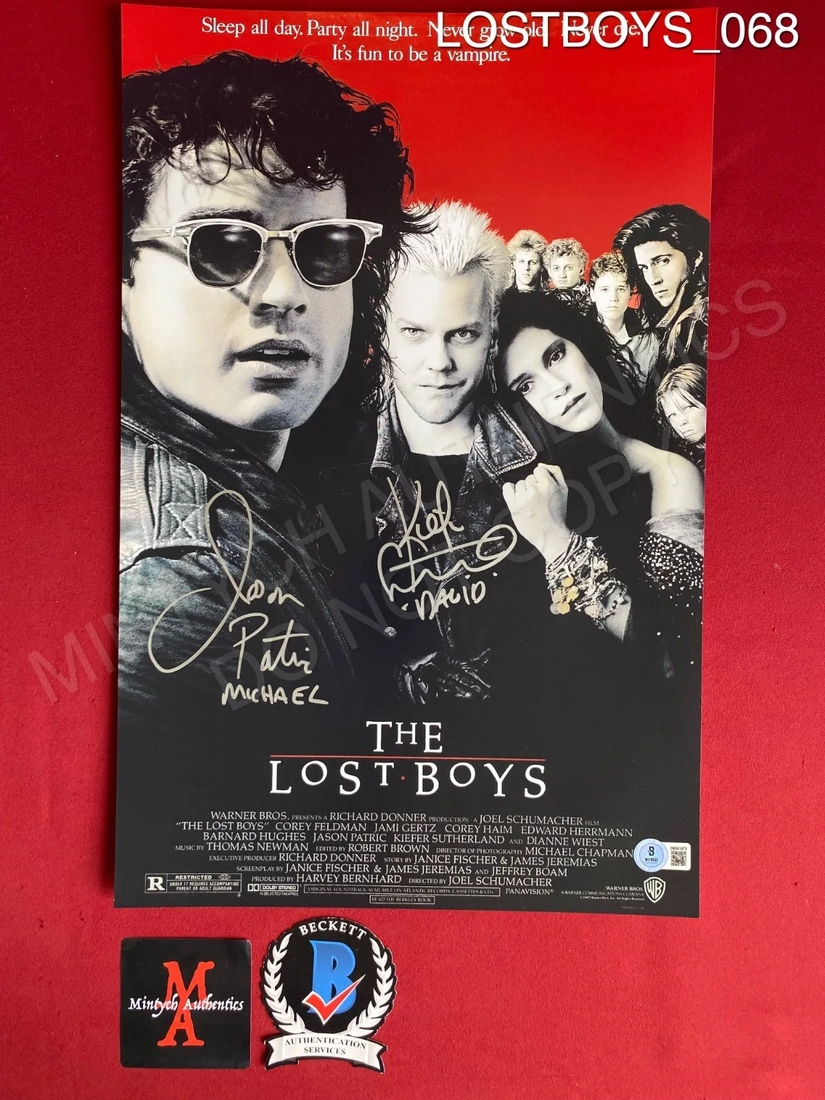 Kiefer Sutherland, Jason Patric — Kiefer Sutherland and Jason Patric dual signed 11x17 photo The Lost Boys Beckett
