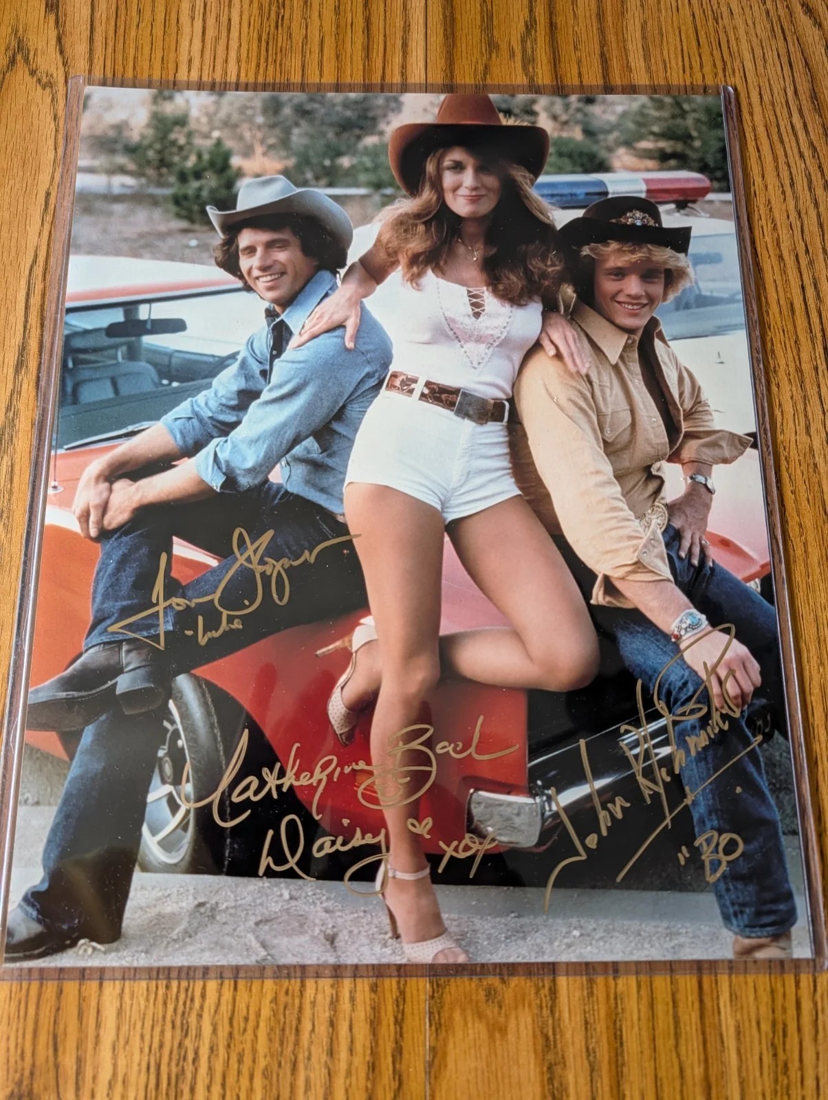 Tom Wopat, Catherine Bach, John Schneider — THE DUKES OF HAZZARD 11X14 Autographed Photo Signed By 3 w/COA SPECTACULAR ITEM