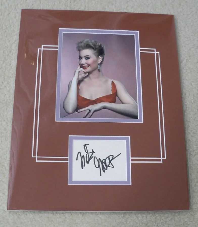 Mitzi Gaynor — Mitzi Gaynor signed card with photo matted ready to frame COA