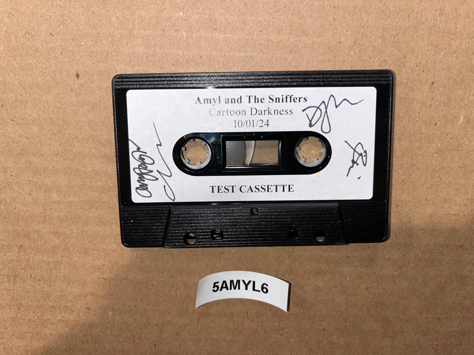Amyl And The Sniffers Signed Autographed Test Cassette Cartoon Darkness 10/01/24, image 2