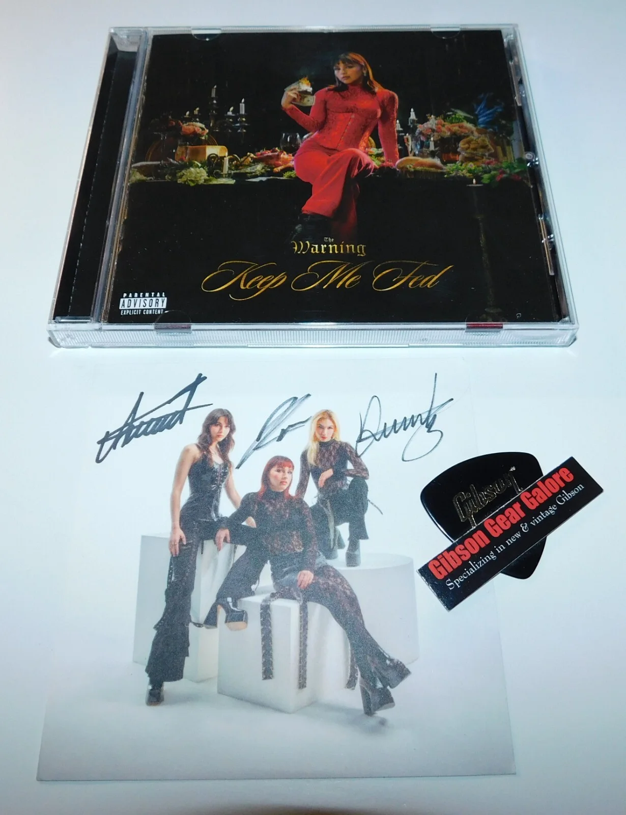 The Warning Band Keep Me Fed Signed CD Pau Guitar Pick Dany Paulina Daniela Pick, image 2