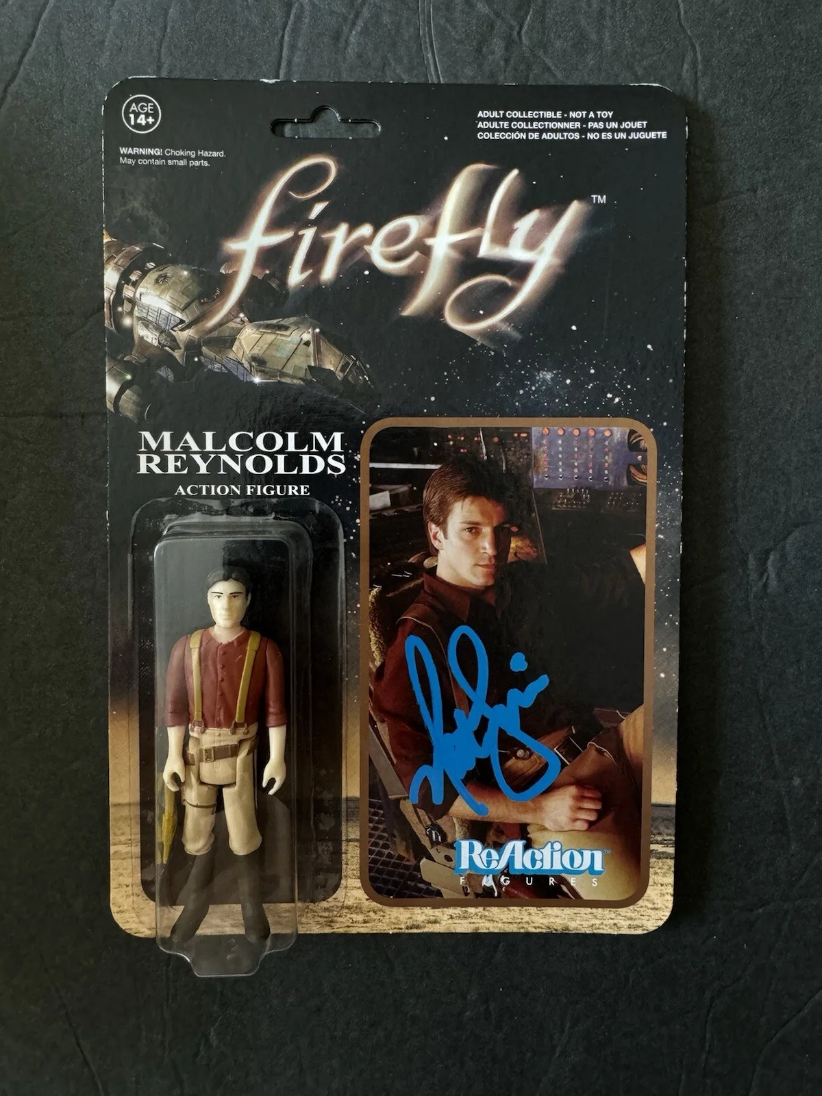 Nathan Fillion — Nathan Fillion Signed Captain Malcom Reynolds Figure Firefly Reaction PSA/DNA