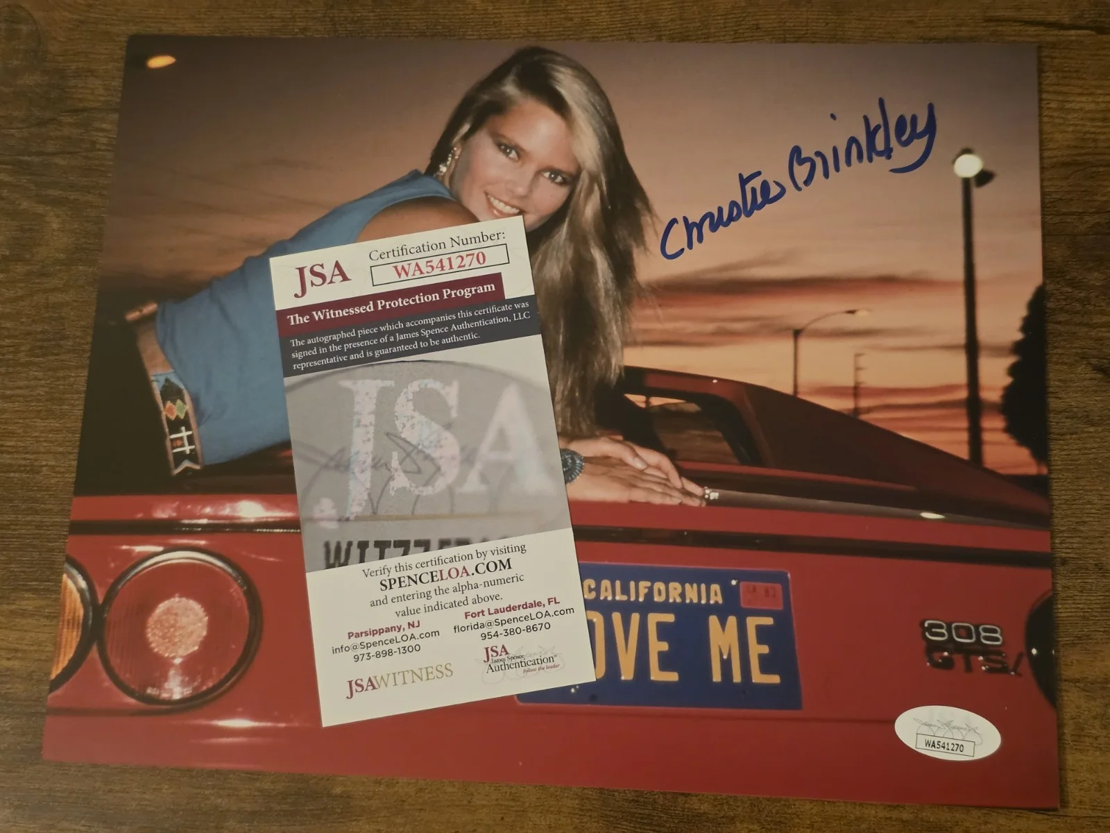 Christie Brinkley — Christie Brinkley Signed Autograph 8x10 Photo Vacation Model JSA Red Ferrari, image 4