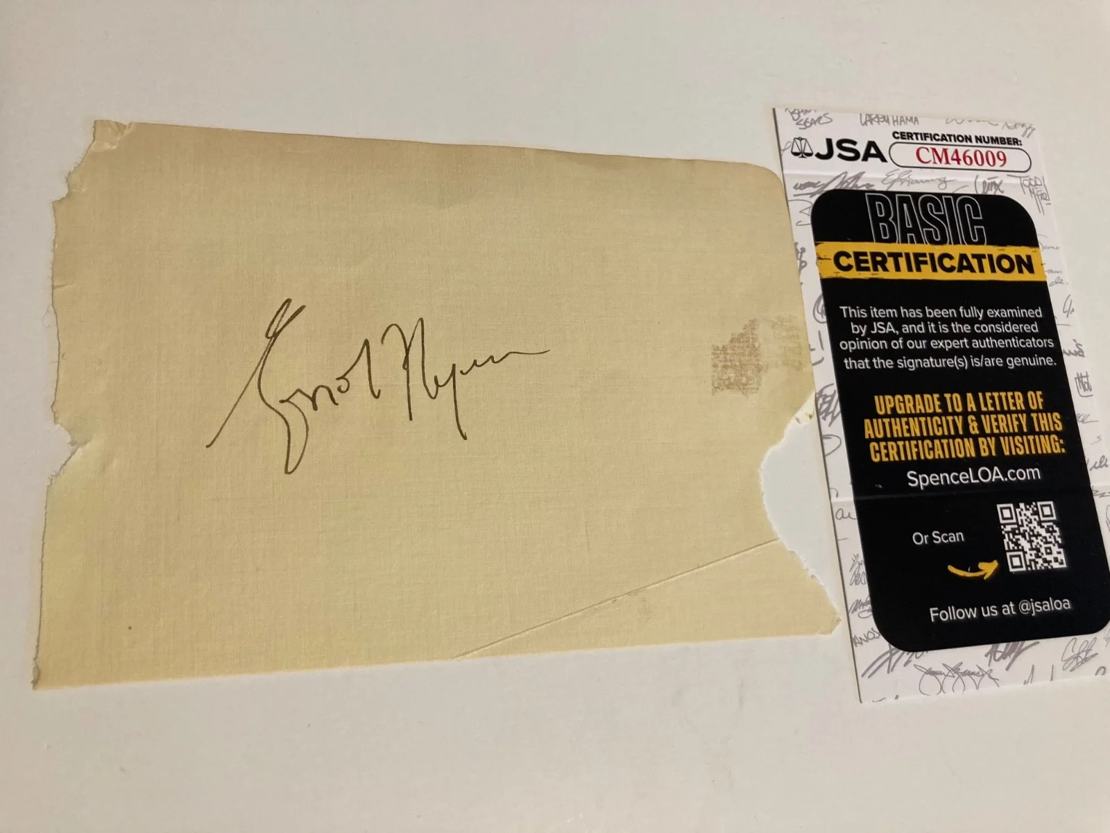 ERROL FLYNN — ERROL FLYNN signed 4x5.5 paper "THE ADVENTURES OF ROBIN HOOD" JSA#CM46009