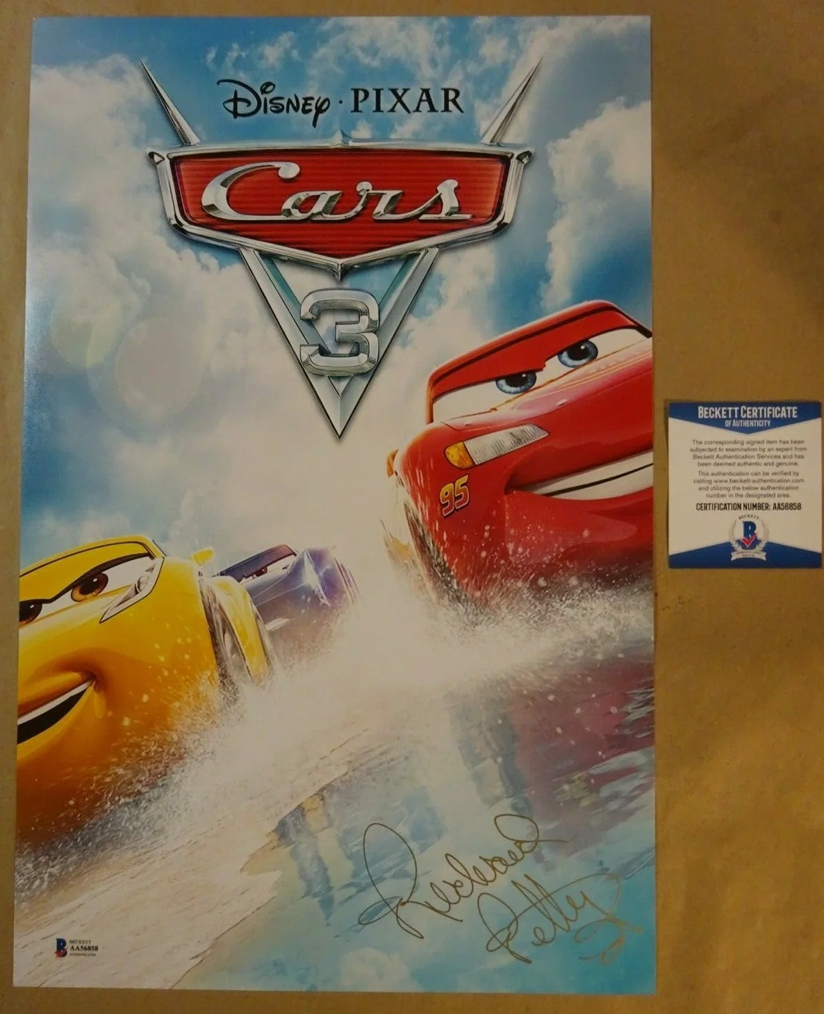Richard Petty — Signed RICHARD PETTY Autographed DISNEY PIXAR CARS 3 11"x17" Photo BECKETT COA