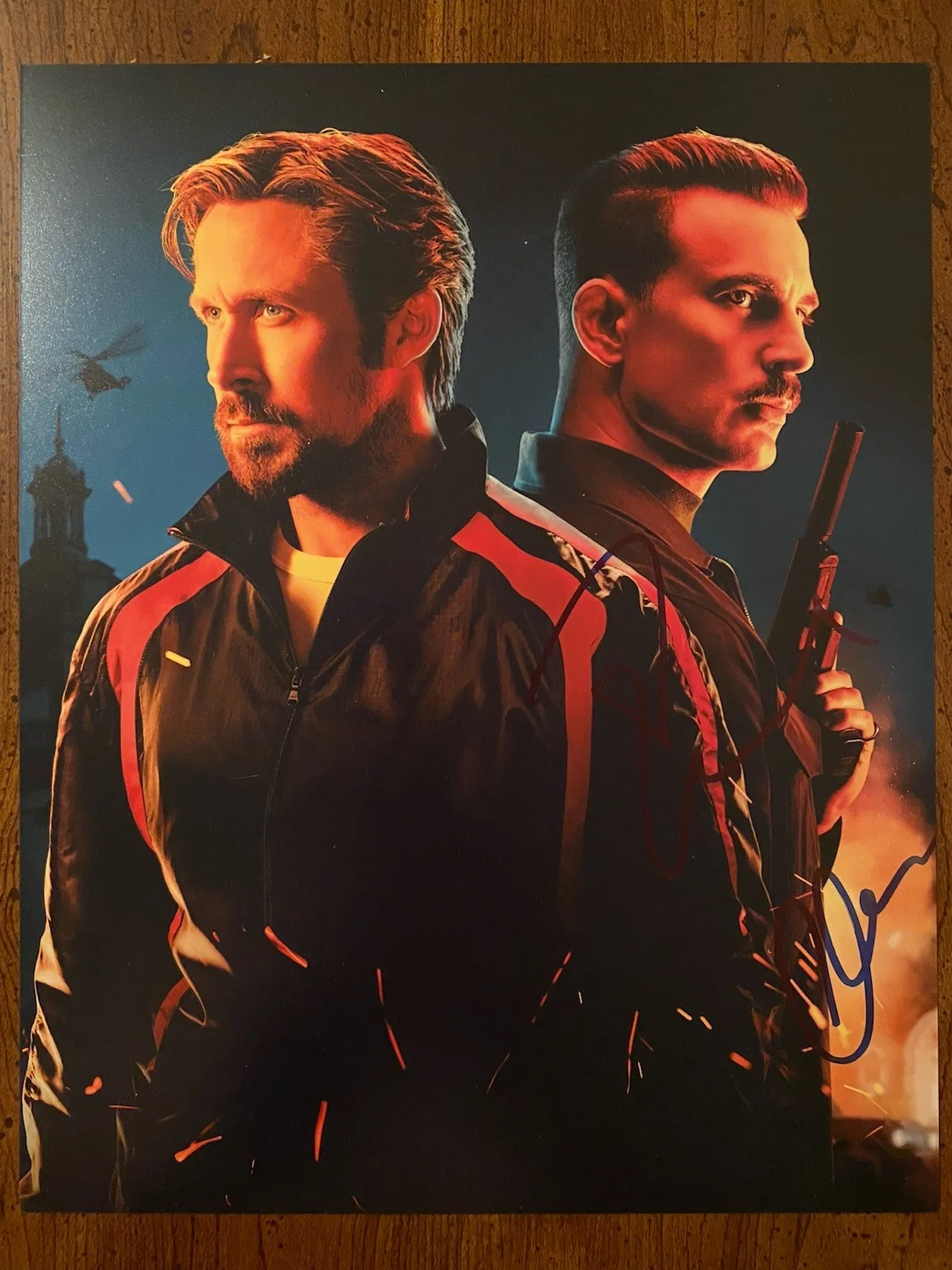 Ryan Gosling, Chris Evans — Ryan Gosling Chris Evans Duel Signed Autographed Photo The Gray Man With COA