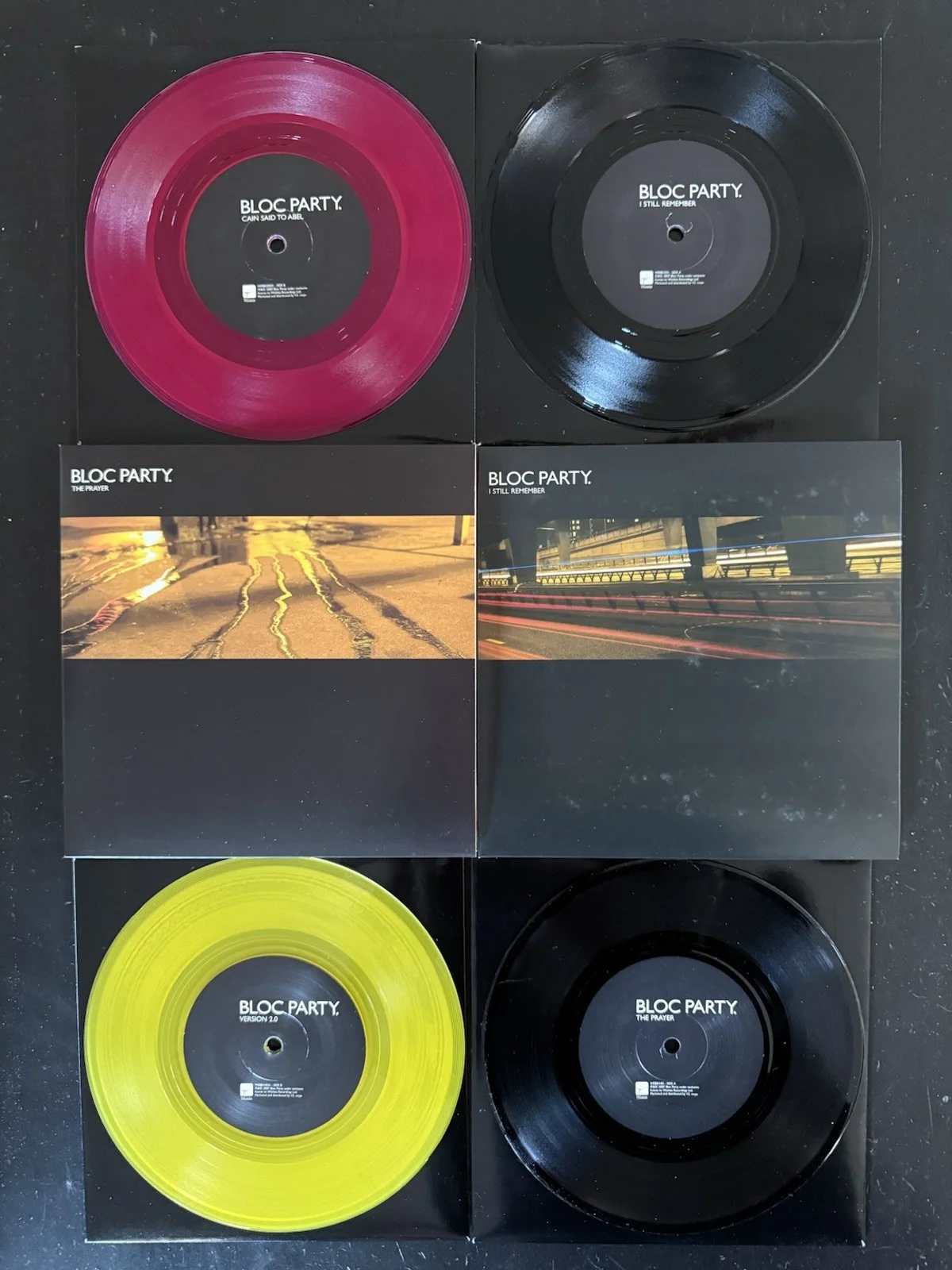 [SIGNED by FULL BAND] BLOC PARTY - ‘SINGLES COLLECTION’ 7” COLORED VINYL BOX SET, image 3