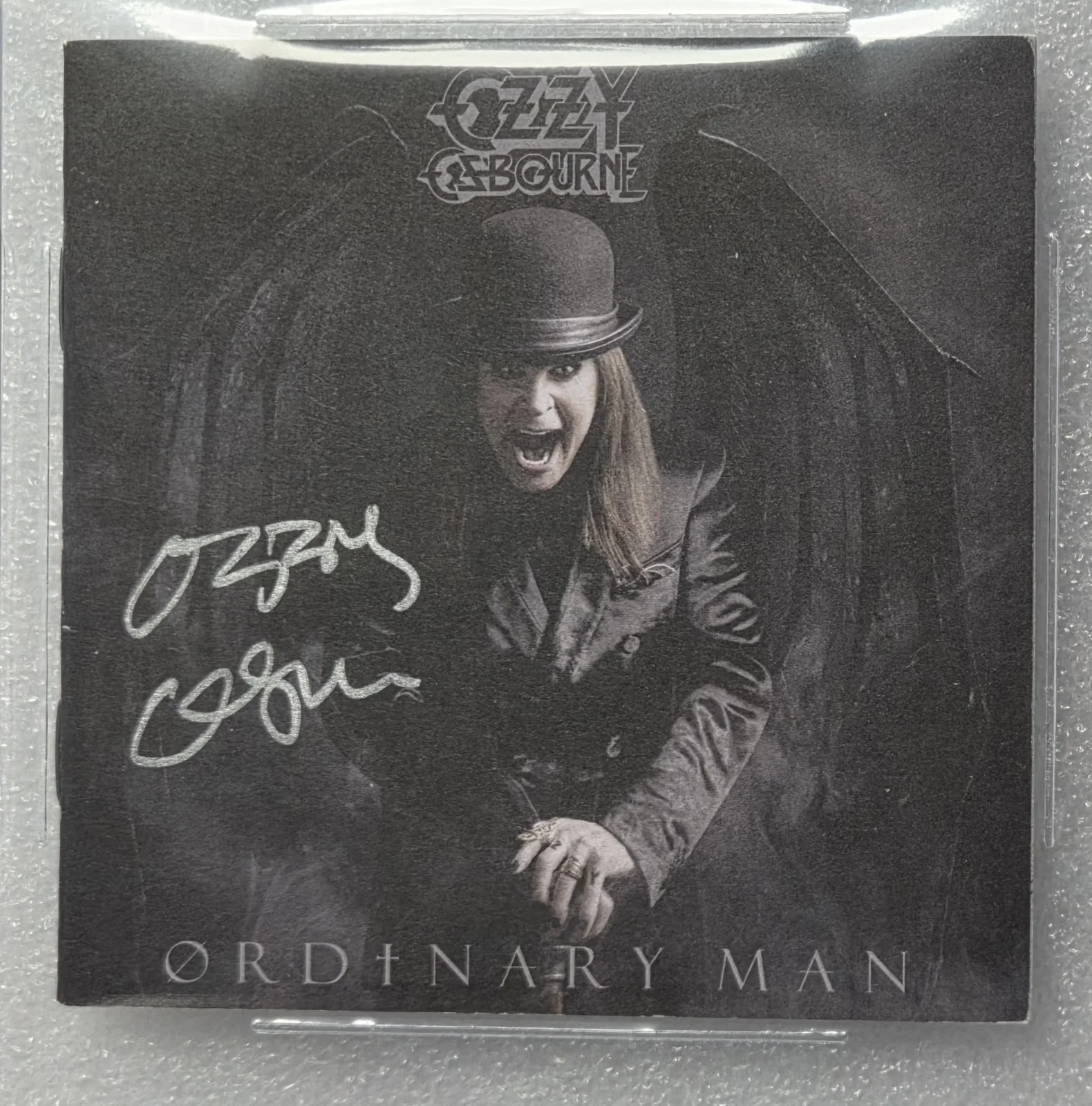 OZZY OSBOURNE SIGNED CD COVER BECKETT BAS COA AUTOGRAPHED SLABBED ORDINARY MAN, image 4