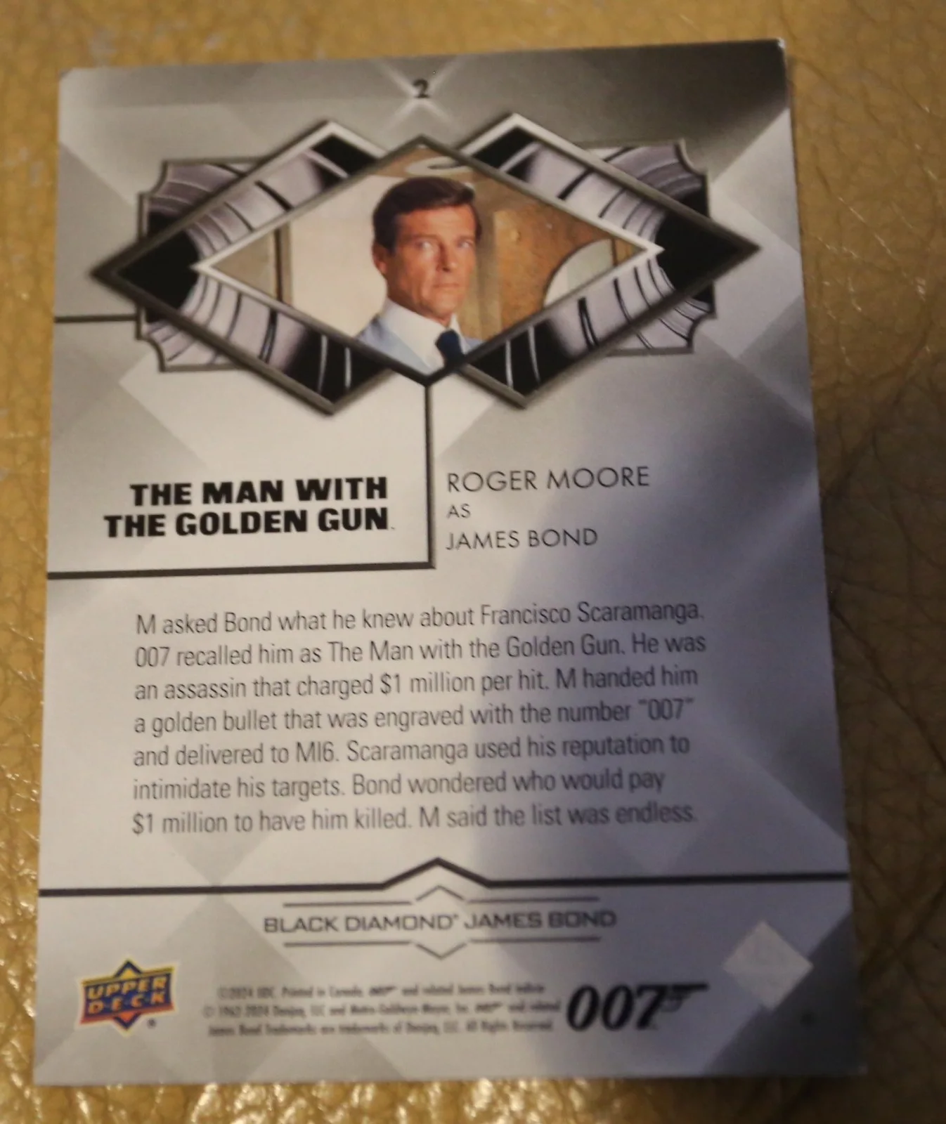 JAMES BOND NUMBER 143 of 199 ROGER MOORE AS BOND BLACK DIAMOND TRADING CARD, image 2