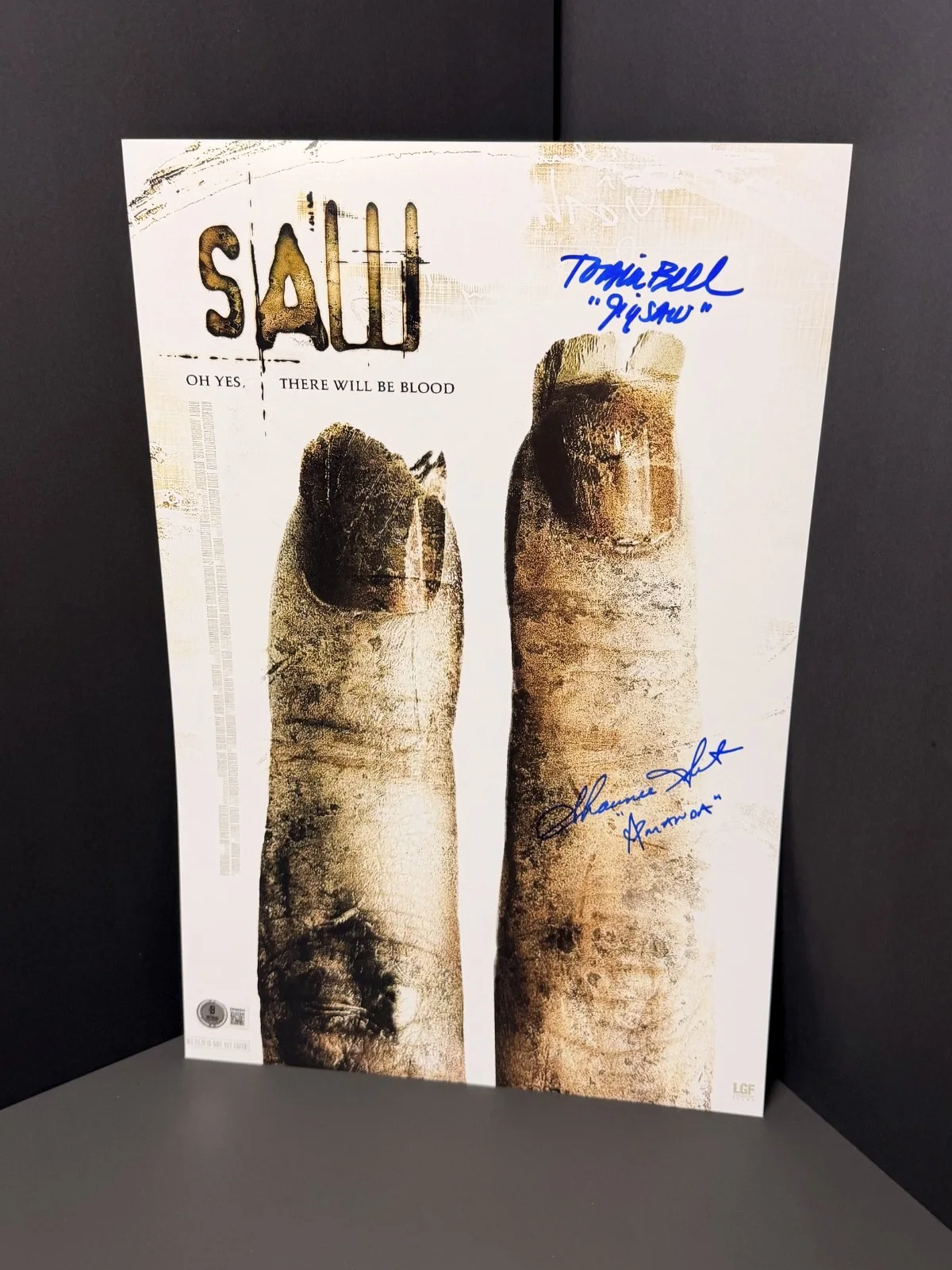 Tobin bell and shawnee smith — Saw 2 11x17 cast signed by: Shawnee smith & Tobin Bell “jigsaw” w/BECKETT-COA
