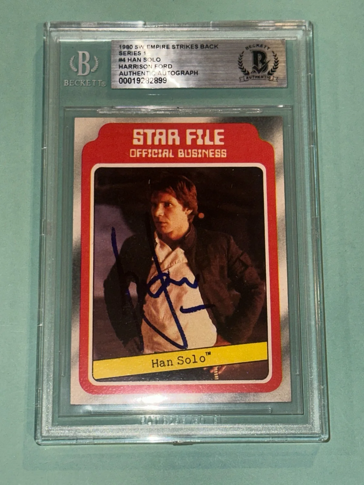 HARRISON FORD — HARRISON FORD Signed 1980 STAR WARS EMPIRE SERIES 1 Card #4 Beckett BAS
